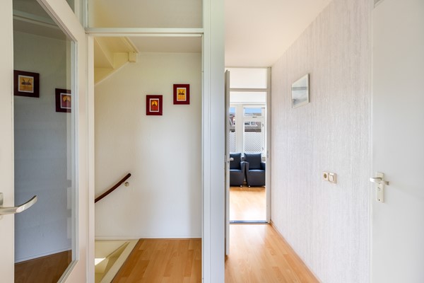 Foto - Te koop: tussenwoning gelegen aan groenvoorziening